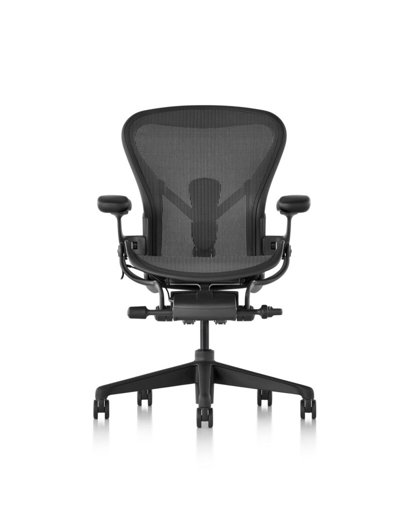 Herman Miller Aeron Remastered chair rear view showing 8Z Pellicle mesh back and adjustable arms